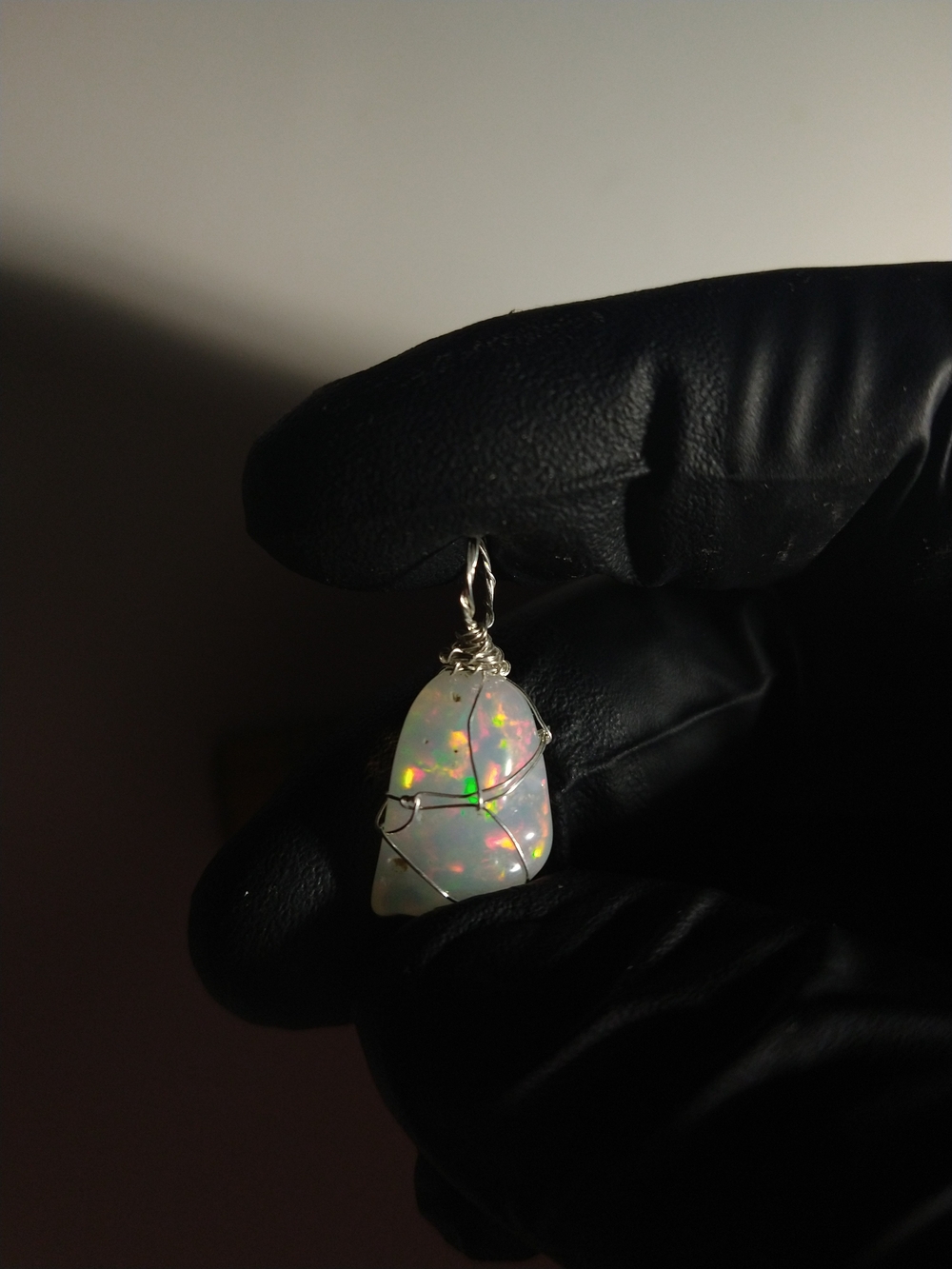 High Grade Opal Tumble Wire Wrap Pendant in Sterling Silver